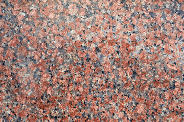 The texture of natural polished granite. Pattern, background.