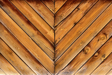 Symmetrical pattern of wooden planks. Texture, background.