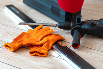 Working tools.rotary hammer, tool box, gloves,Bubble level