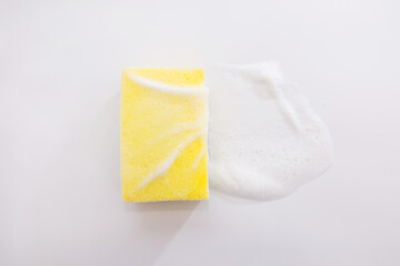 kitchen sponge with foam isolated on white