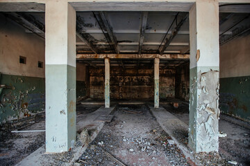 Fototapeta na wymiar Old broken empty abandoned industrial building interior