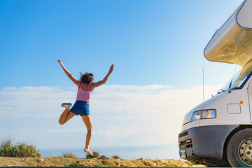 Woman enjoy trip with motorhome