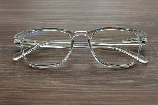 Glasses for vision with dioptria on the wooden table office