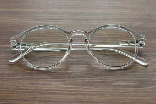 Glasses for vision with dioptria on the wooden table office