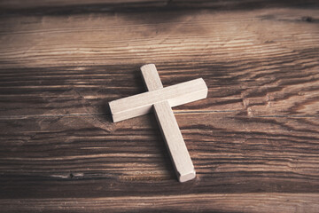 wooden cross on the table