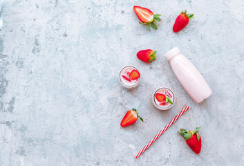 Fototapeta na wymiar Tasty strawberry milk shake on white background. Strawberry smoothies. Strawberry yogurt with fresh berries