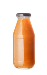 Bottle with tasty mango sauce on white background