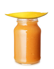Jar with tasty mango sauce on white background