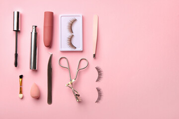 False eyelashes, decorative cosmetic and tools on color background