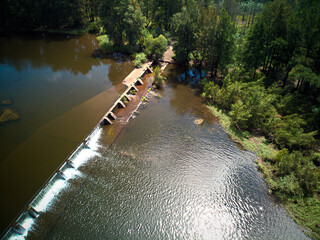 The Nepean River Weir at Penrith with surrounding bushland.