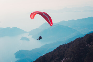 Paraglider flying on Oludeniz beach in Fethiye, Mugla, Travel destination. Summer and holiday concept. © Seda Servet