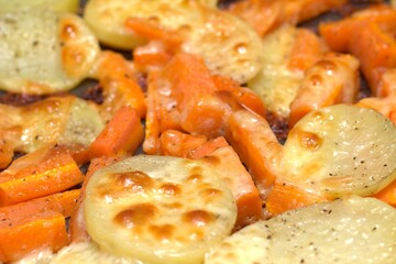 baked potato with carrot and cheese, carrot and potato baked with cheese, roasted vegetables with cheese, roasted carrots for meal	