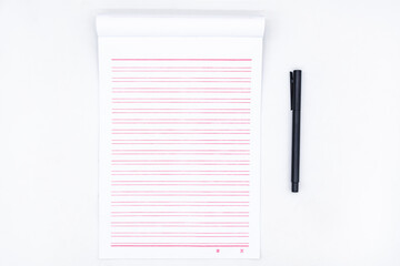 Stationery and a black pen