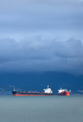 English Bay Freighters Storm Clouds. Freighters under storm clouds in English Bay.

