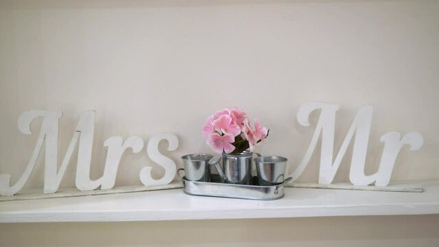 Mrs and Mr sign words decoration interior for wedding party. High quality FullHD footage