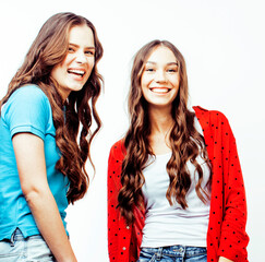 two best friends teenage girls together having fun, posing emotional on white background, besties...