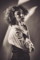 Vintage portrait of a young girl with curly hair