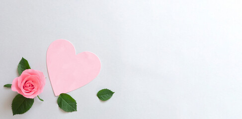 Pink rose flower and heart frame.  ピンク色のバラの花とハートのフレーム