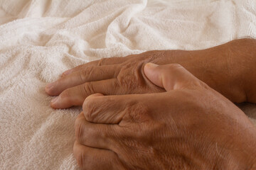 Fototapeta premium Adult man with pain in the hands. Joint pain in young adults.