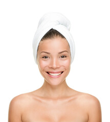 Asian beauty woman clean face after shower wearing bath towel on head for wet hair. Smiling beautiful multiracial model upper body anti-aging skincare portrait isolated on white background. - 421148616