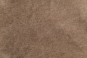 Fototapeta premium fabric grunge background, real cotton denim brown, wrinkled, frayed, close