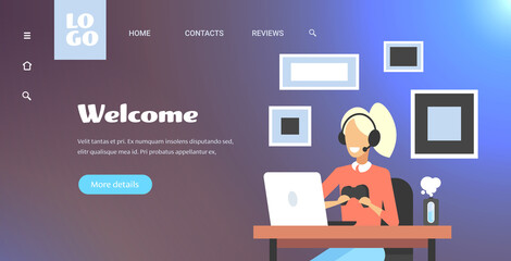 girl blogger commentating game process video review blogging live streaming concept gamer in headphones using gamepad playing games on laptop portrait horizontal copy space