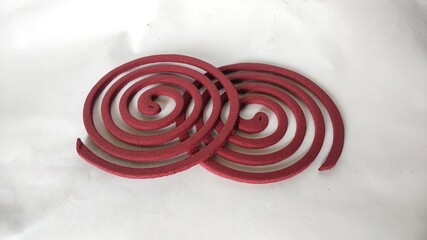 Mosquito repellent coil isolated on white background.
