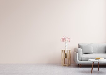 Living room with empty pink walls, decorated with beautiful flowers and sofas.3d rendering.