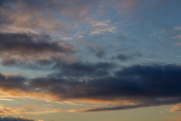 Fototapeta premium Dark blue clouds. Blue sky, sunset. Natural background.
