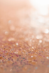 Gold abstract glitter background with shiny bokeh
