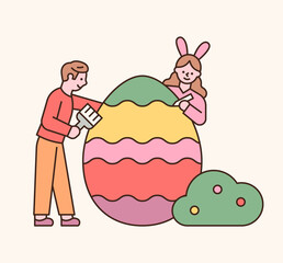 Easter characters. The boy and the girl are coloring Easter eggs. flat design style minimal vector illustration.