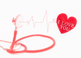 Medical stethoscope and red heart with rhythmic waves