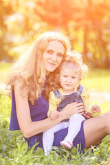 Mother with daughter. Happy family portrait. Single parent. Nature autumn background. Two people. Summer park lifestyle. Motherhood concept. Home outdoors life