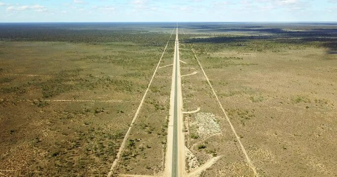 Long Straight Road Of Eyre Highway Via Nullarbor Plain Linking Western Australia and South Australia. - aerial