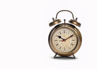 Vintage alarm clock isolated on white