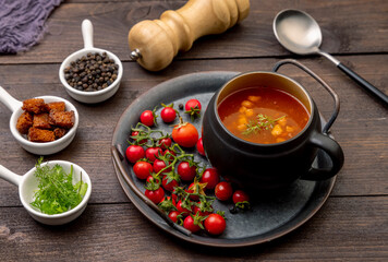 Homemade tomato soup with tomatoes, herbs, and spices. 