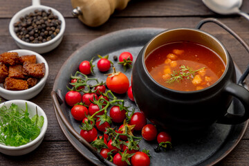 Homemade tomato soup with tomatoes, herbs, and spices. 