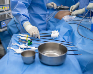 advanced, assistant, blue, camera, cholecystectomy, clamp, clinic, closeup, doctor, endoscopy, equipment, gallbladder, glove, gown, grasper, hand, hole, hospital, instrument, invasive, key, key hole, 