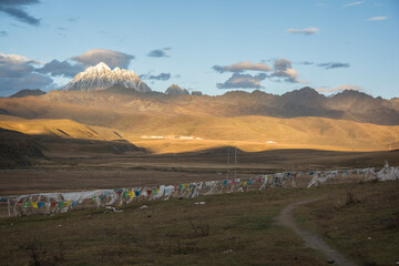 Tibetan praying flags in the beautiful grassland of Tagong, Kangding, Garzê Tibetan Autonomous Prefecture, Sichuan, China