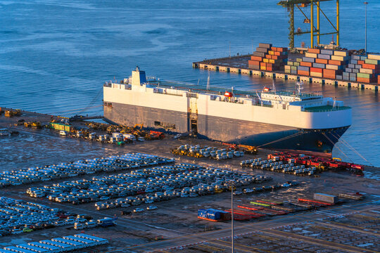 Ro-Ro Ship / car carrier ship anchored at the terminal.