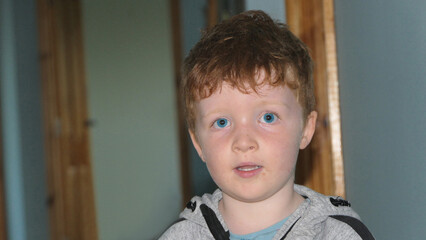 Red headed boy with blue eyes