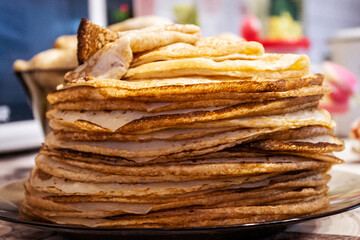 Appetite, delicious pancakes on a plate close-up.