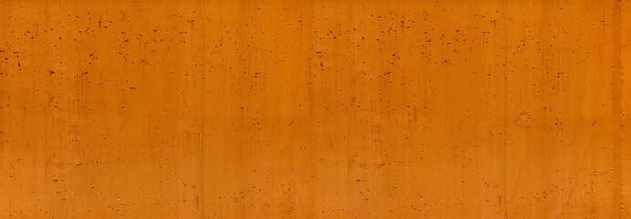 panoramic orange painted concrete wall background