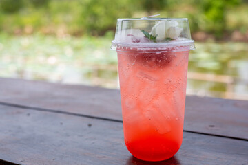 Fruit juice mixed with soda , Strawberry soda