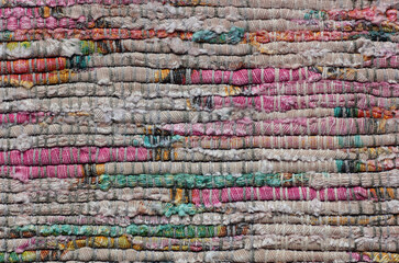 Coarse cotton woven handmade fabric, background and texture for your design, closeup or macro, natural dye, zero waste rag and eco friendly handmade textile concept