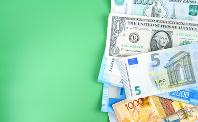 Banknotes of the USA, Europe, Russia and Kazakhstan. Currency exchange concept. International financial relations. Money background. Selective focus.