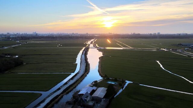 Aerial view of Ransdorp a small countryside village near Amsterdam. Looking a sunset