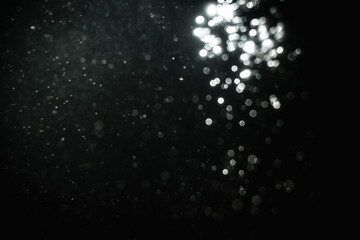 Glittering stars of blur white bokeh