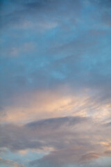 Rain clouds in the sky at sunset