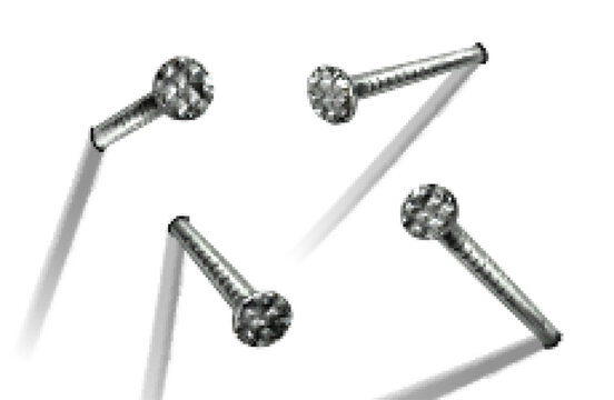 Nails hammered into wall steel or silver pin heads